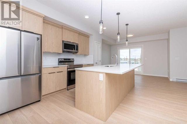 2206, - 19489 Main Street Se, Condo with 2 bedrooms, 2 bathrooms and 1 parking in Calgary AB | Image 4