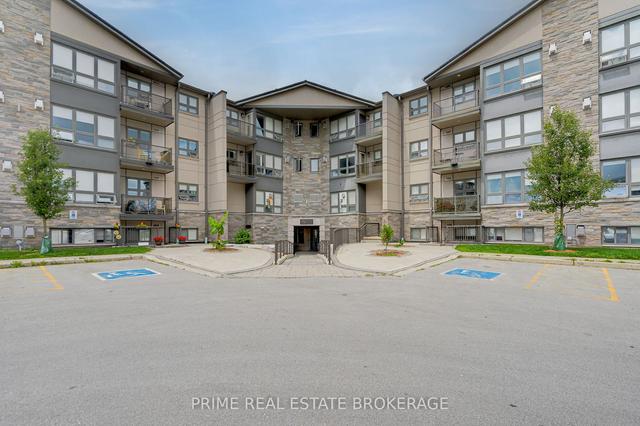 214 - 15 Jacksway Cres, Condo with 2 bedrooms, 2 bathrooms and 1 parking in London ON | Image 1