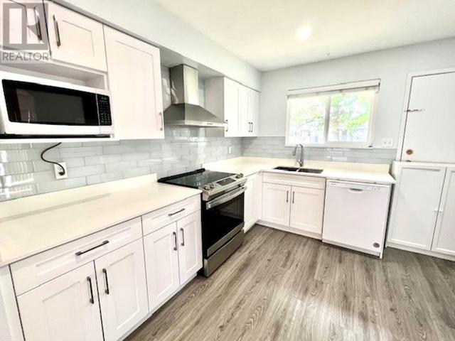 1129 Laburnum Avenue, House detached with 6 bedrooms, 3 bathrooms and 5 parking in Port Coquitlam BC | Image 2