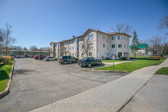 303 - 107 Bond St, Condo with 2 bedrooms, 2 bathrooms and 1 parking in Orillia ON | Image 21