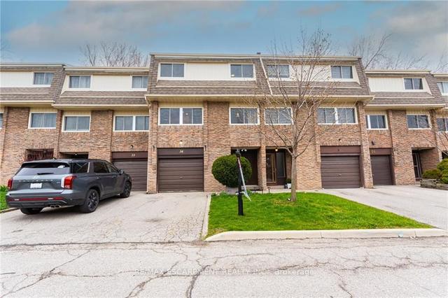 34 - 7430 Copenhagen Rd E, Townhouse with 3 bedrooms, 2 bathrooms and 2 parking in Mississauga ON | Image 1