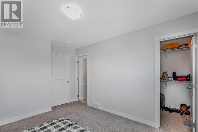 18 Evanscrest Park Nw, House attached with 3 bedrooms, 2 bathrooms and 3 parking in Calgary AB | Image 19