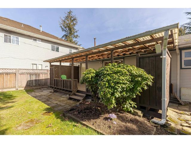 7045 142 Street, House detached with 5 bedrooms, 3 bathrooms and 3 parking in Surrey BC | Image 32
