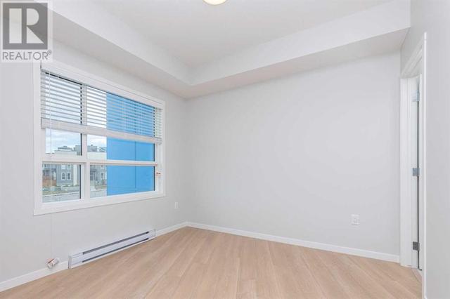 2206, - 19489 Main Street Se, Condo with 2 bedrooms, 2 bathrooms and 1 parking in Calgary AB | Image 12