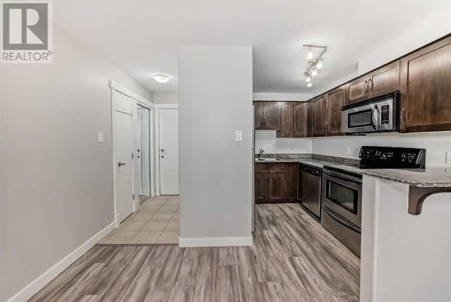 3, - 2104 17 Street Sw, Condo with 2 bedrooms, 1 bathrooms and 1 parking in Calgary AB | Image 4