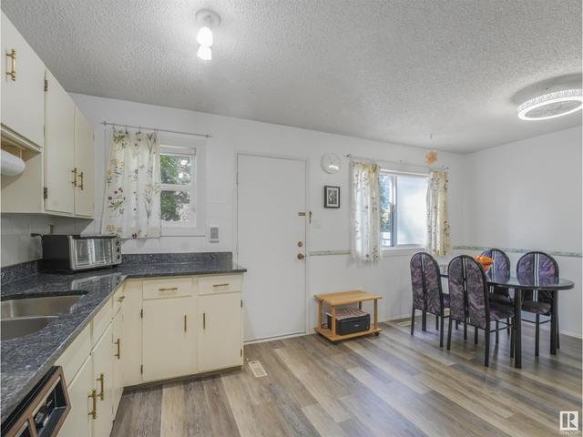 1052 106 St Nw, House attached with 3 bedrooms, 1 bathrooms and 2 parking in Edmonton AB | Image 15