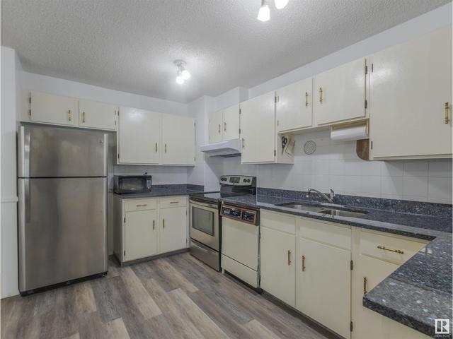 1052 106 St Nw, House attached with 3 bedrooms, 1 bathrooms and 2 parking in Edmonton AB | Image 13