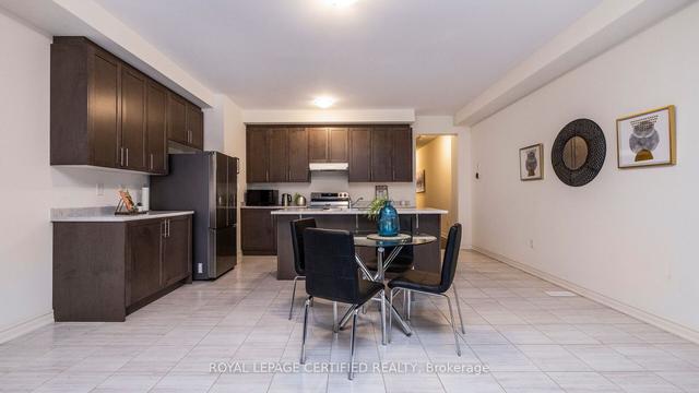 128 Adventura Rd, House attached with 4 bedrooms, 3 bathrooms and 3 parking in Brampton ON | Image 4