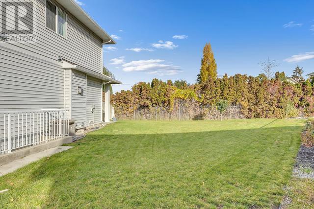 909 Currell Crescent, House detached with 4 bedrooms, 3 bathrooms and 4 parking in Kelowna BC | Image 45