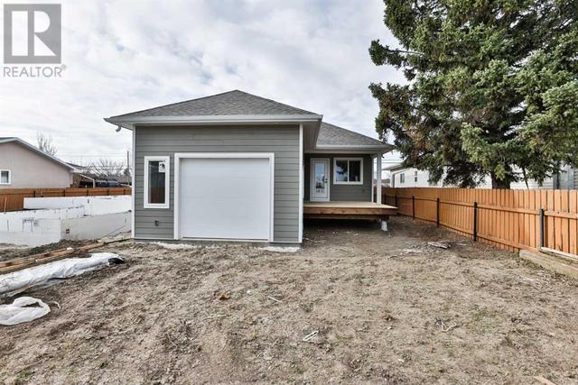 2128 21 Avenue, House detached with 3 bedrooms, 2 bathrooms and 2 parking in Coaldale AB | Image 25