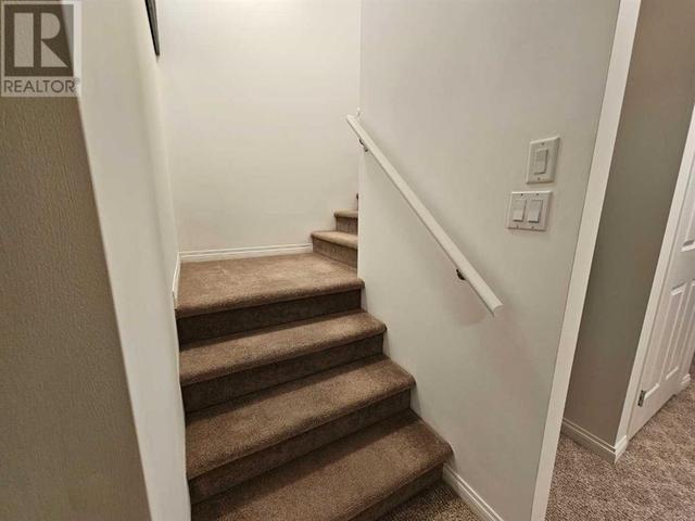 2, - 402 Couleecreek Boulevard S, House attached with 2 bedrooms, 2 bathrooms and 2 parking in Lethbridge AB | Image 26