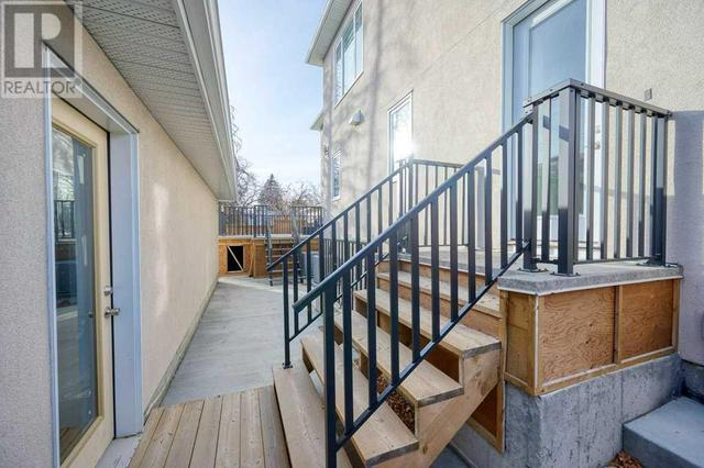 54 Malibou Road Sw, House detached with 5 bedrooms, 3 bathrooms and 3 parking in Calgary AB | Image 38