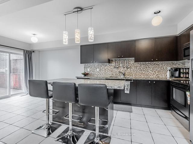 141 Beer Cres, House attached with 4 bedrooms, 3 bathrooms and 3 parking in Ajax ON | Image 2