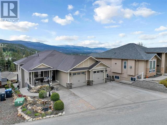 1297 Tanemura Crescent, House detached with 4 bedrooms, 4 bathrooms and 3 parking in Kelowna BC | Image 1