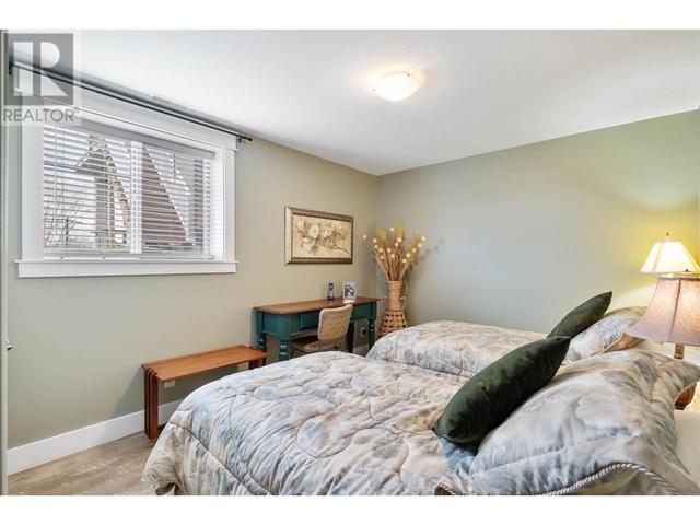 1297 Tanemura Crescent, House detached with 4 bedrooms, 4 bathrooms and 3 parking in Kelowna BC | Image 50