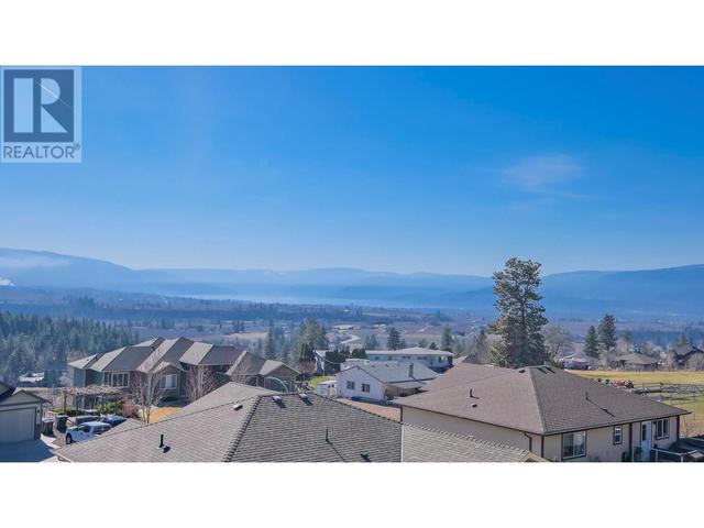 1257 Feedham Avenue, House detached with 4 bedrooms, 3 bathrooms and 5 parking in Kelowna BC | Image 4