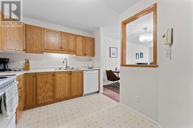 3415, - 3415 Hawksbrow Point Nw, Condo with 2 bedrooms, 1 bathrooms and 1 parking in Calgary AB | Image 8