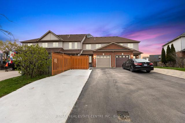 140 Manley Lane, House attached with 3 bedrooms, 3 bathrooms and 4 parking in Milton ON | Image 26
