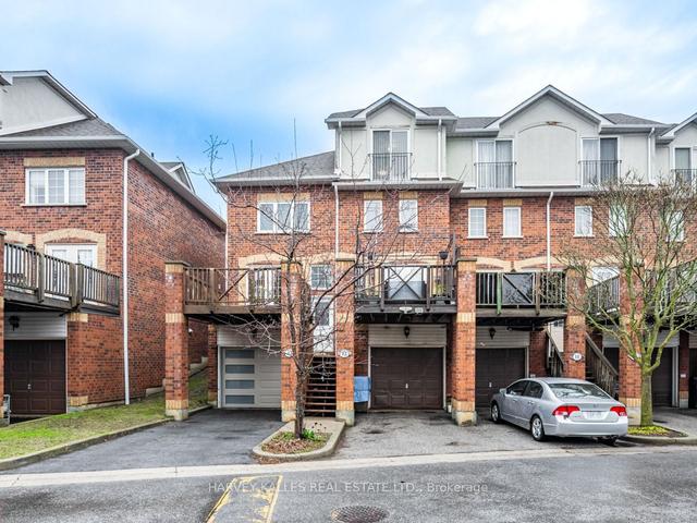 12 - 2 Hedge End Rd, Townhouse with 3 bedrooms, 3 bathrooms and 2 parking in Toronto ON | Image 1