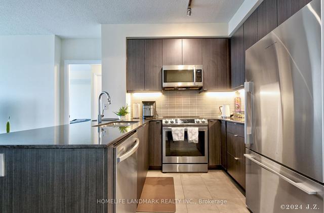 503 - 50 Thomas Riley Rd, Condo with 2 bedrooms, 2 bathrooms and 1 parking in Toronto ON | Image 2