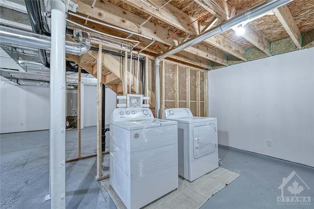 Laundry room in Basement. | Image 25
