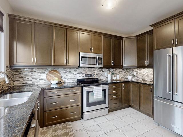 57 Collie Cres, House detached with 5 bedrooms, 4 bathrooms and 4 parking in Whitchurch Stouffville ON | Image 32