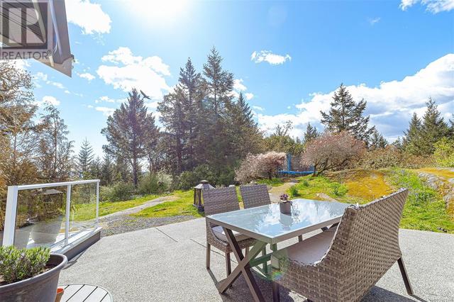 8518 Tribune Terr, House detached with 5 bedrooms, 3 bathrooms and 4 parking in North Saanich BC | Image 53