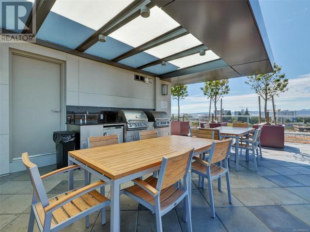 COMMON ROOF TOP ENTERTAINMENT AREA WITH OUTDOOR KITCHEN | Image 27