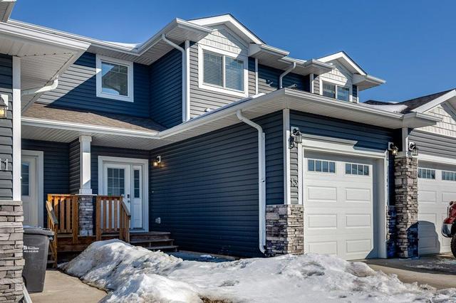 13 Sullivan Close, Home with 4 bedrooms, 2 bathrooms and 1 parking in Red Deer AB | Image 2