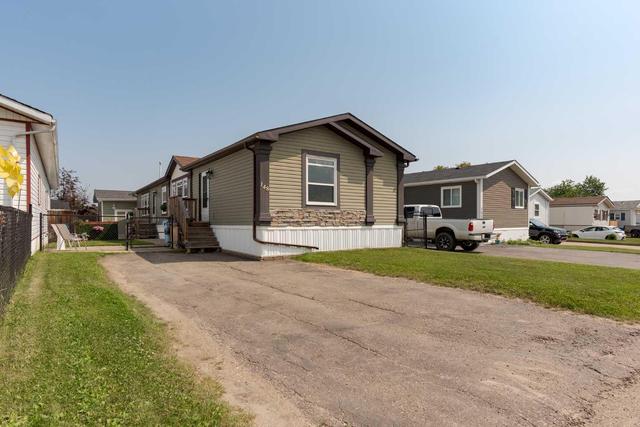 148 Card Cres, House detached with 3 bedrooms, 2 bathrooms and 2 parking in Wood Buffalo AB | Image 2