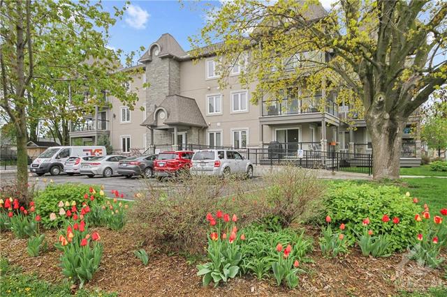 Downsize Without Downgrading! Welcome Home to this stablished condo building with secured intercom system at the front entrance, Ramp entrance for wheelchair access, elevator, and heated undergrou | Image 1
