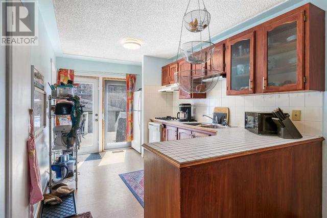 913 4 Ave Nw, House detached with 2 bedrooms, 1 bathrooms and 2 parking in Calgary AB | Image 13