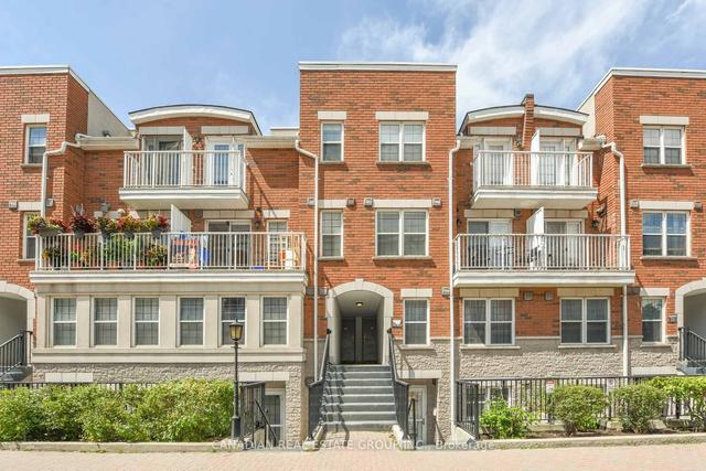 18 - 37 Four Winds Dr, Townhouse with 2 bedrooms, 3 bathrooms and 1 parking in Toronto ON | Image 1