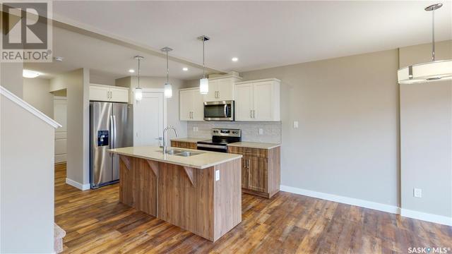 218 Schmeiser Bend, House semidetached with 3 bedrooms, 3 bathrooms and null parking in Saskatoon SK | Image 10