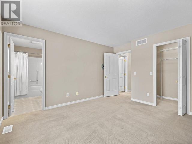 11 - 3950 Gallaghers Blvd S, House attached with 3 bedrooms, 3 bathrooms and 4 parking in Kelowna BC | Image 23