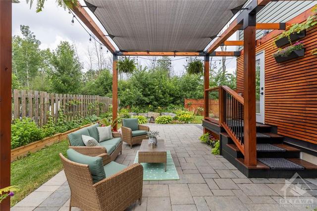 Enjoy summer nights on your 28x16 ft oversized interlock patio with custom cedar gazebo. | Image 15