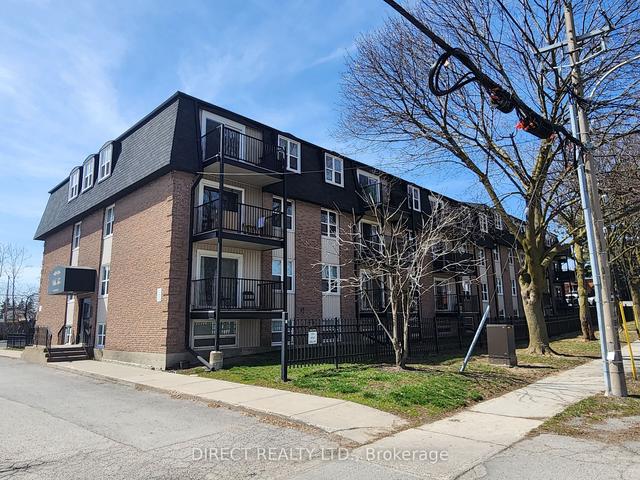403 - 25 College St E, Condo with 2 bedrooms, 1 bathrooms and 1 parking in Belleville ON | Image 1