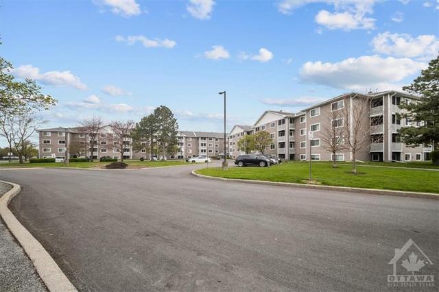 310 - 318 Lorry Greenberg Dr, Condo with 2 bedrooms, 2 bathrooms and 1 parking in Ottawa ON | Image 2
