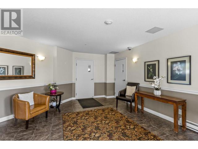 106 - 1961 Durnin Rd, Condo with 2 bedrooms, 2 bathrooms and 1 parking in Kelowna BC | Image 25
