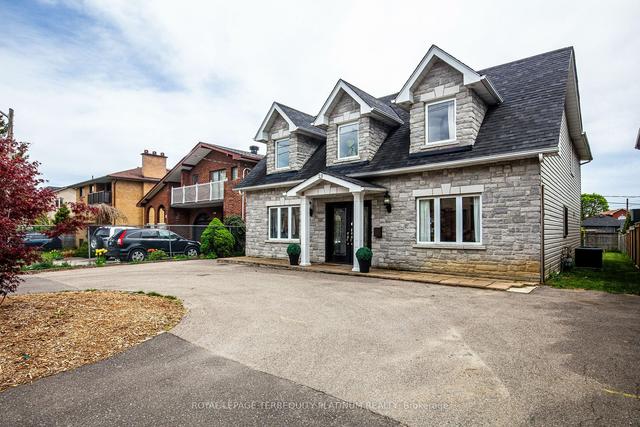 23 Carnation Ave, House detached with 5 bedrooms, 3 bathrooms and 6.5 parking in Toronto ON | Image 1