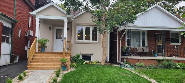 128 Fourth St, House detached with 2 bedrooms, 2 bathrooms and 2 parking in Toronto ON | Image 1