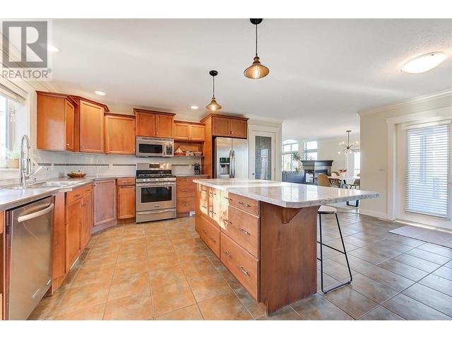 291 Sandpiper Crt, House detached with 5 bedrooms, 3 bathrooms and 6 parking in Kelowna BC | Image 32