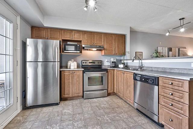 307 - 1479 Maple Ave, Condo with 1 bedrooms, 1 bathrooms and 1 parking in Milton ON | Image 2