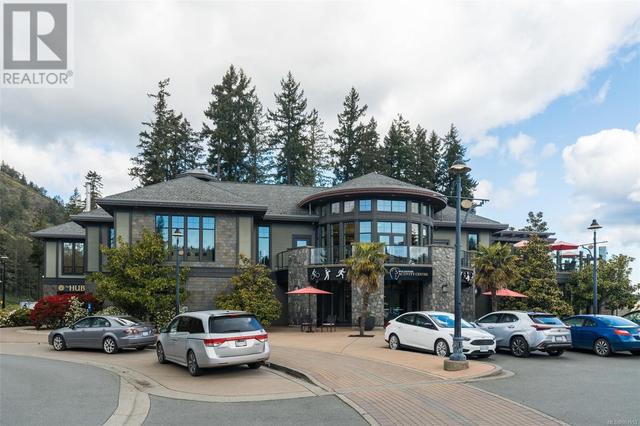 101 - 2045 Country Club Way, House attached with 2 bedrooms, 2 bathrooms and 2 parking in Langford BC | Image 41