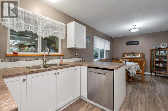 4199 Enquist Rd, House detached with 3 bedrooms, 2 bathrooms and 10 parking in Strathcona D (Oyster Bay   Buttle Lake) BC | Image 8