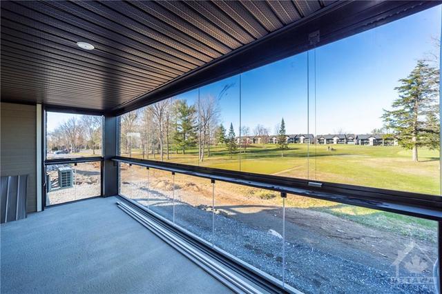 Balcony 20' x 7' overlooking the golf course | Image 3