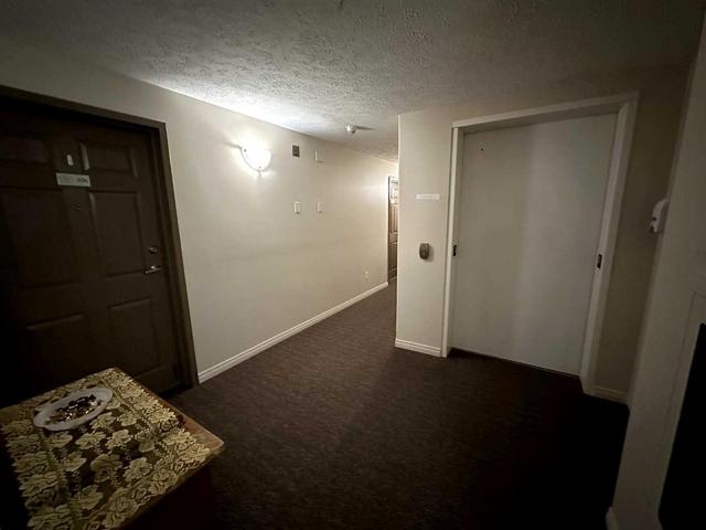 302 - 203 Centre St N, Condo with 1 bedrooms, 1 bathrooms and 1 parking in Sundre AB | Image 16