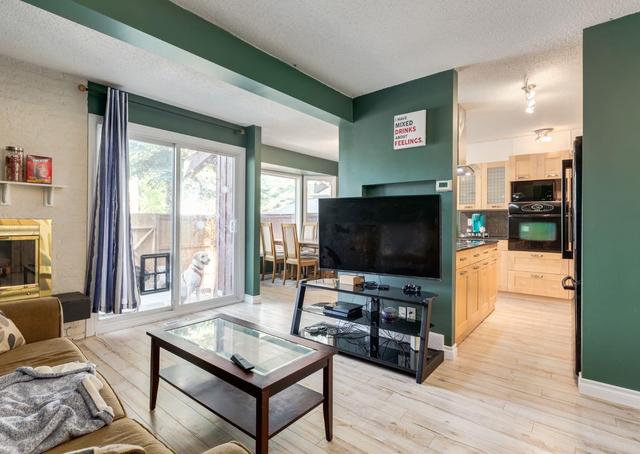 124 - 3219 56 St Ne, Home with 3 bedrooms, 1 bathrooms and 2 parking in Calgary AB | Image 6
