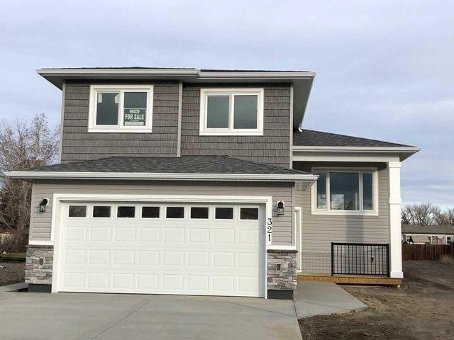321 East 250 North, House detached with 3 bedrooms, 3 bathrooms and 2 parking in Raymond AB | Image 1