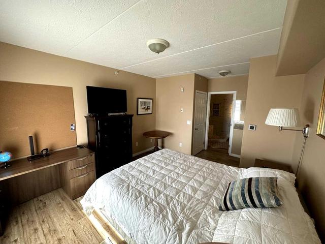 302 - 203 Centre St N, Condo with 1 bedrooms, 1 bathrooms and 1 parking in Sundre AB | Image 10